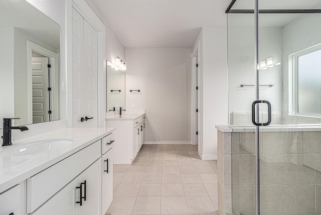 1930 Pueblo Nuevo Path, Houston, TX 77077 - bathroom featuring two vanities, a stall shower, and baseboards