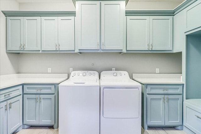 8105 Denali Dr, Corpus Christi, TX 78414 - laundry room featuring cabinet space and washing machine and dryer