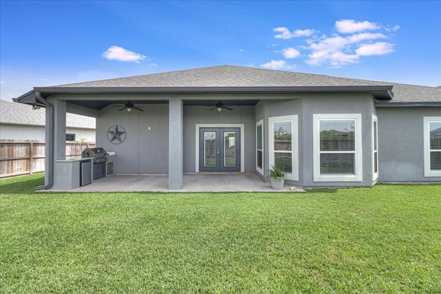 8105 Denali Dr, Corpus Christi, TX 78414 - back of property with a ceiling fan, area for grilling, french doors, a patio, and a shingled roof
