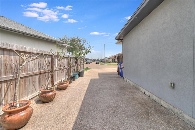 8105 Denali Dr, Corpus Christi, TX 78414 - view of yard featuring a patio area and a residential view