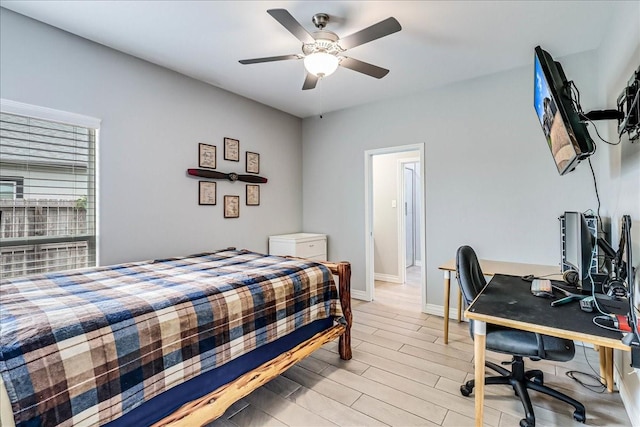 8105 Denali Dr, Corpus Christi, TX 78414 - bedroom featuring light wood-style floors, baseboards, ceiling fan, and a desk