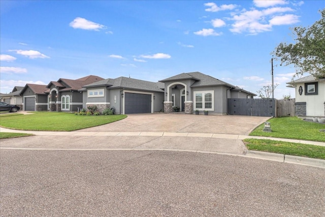 8105 Denali Dr, Corpus Christi, TX 78414 - view of front of property with stucco siding, an attached garage, a gate, and driveway