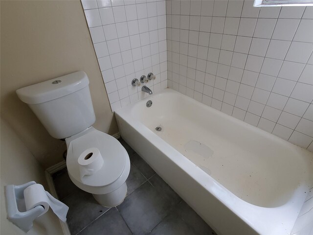 4919 Redfish Reef St, Bacliff, TX 77518 - bathroom with toilet, a bath, tile patterned floors, and a shower