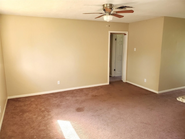 4919 Redfish Reef St, Bacliff, TX 77518 - spare room with a ceiling fan, carpet floors, and baseboards