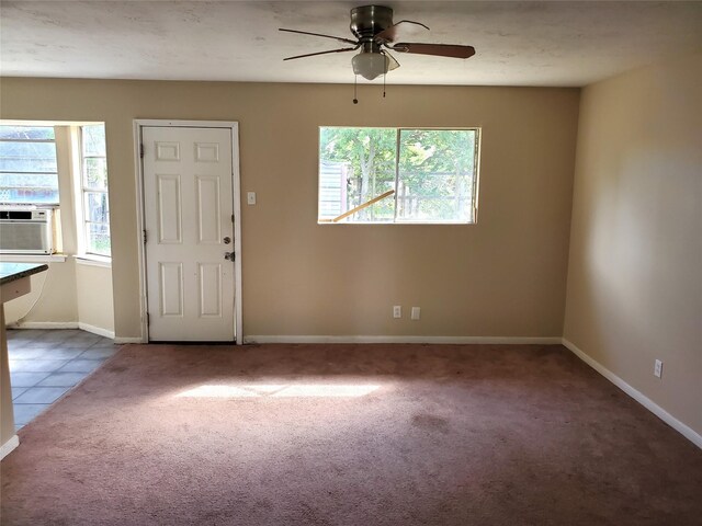 4919 Redfish Reef St, Bacliff, TX 77518 - carpeted entrance foyer featuring ceiling fan and baseboards