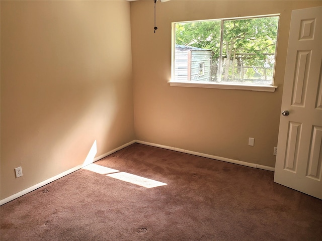 4919 Redfish Reef St, Bacliff, TX 77518 - carpeted spare room with baseboards
