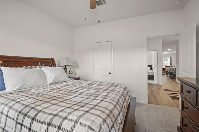 3511 Queensberry Ct, Huffman, TX 77336 - bedroom with carpet floors, baseboards, and wood finished floors