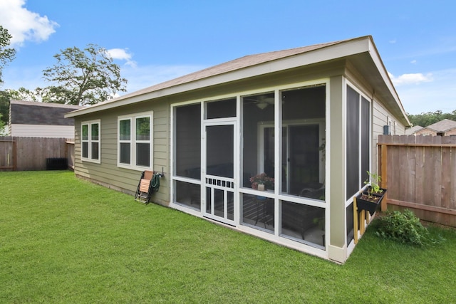 3511 Queensberry Ct, Huffman, TX 77336 - back of house with a sunroom