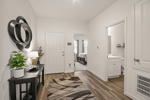 3511 Queensberry Ct, Huffman, TX 77336 - entrance foyer with wood finished floors and baseboards