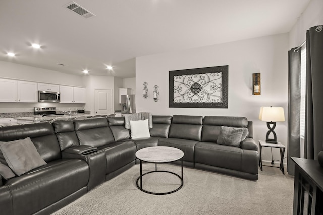 3511 Queensberry Ct, Huffman, TX 77336 - living room featuring light colored carpet and recessed lighting