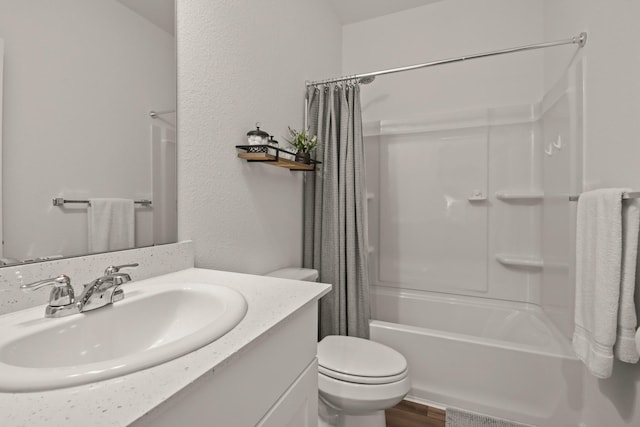 3511 Queensberry Ct, Huffman, TX 77336 - full bathroom with shower / bath combo with shower curtain, toilet, vanity, a textured wall, and wood finished floors