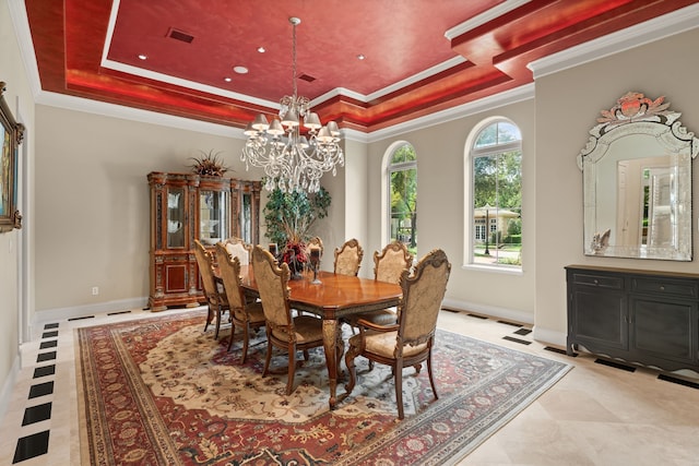 16 Grand Mnr, Sugar Land, TX 77479 - dining space with a tray ceiling, a chandelier, ornamental molding, baseboards, and recessed lighting