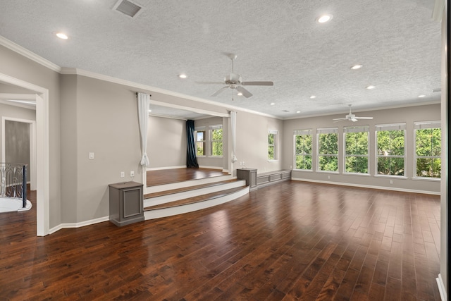 16 Grand Mnr, Sugar Land, TX 77479 - unfurnished living room featuring a ceiling fan, wood finished floors, baseboards, recessed lighting, and a textured ceiling