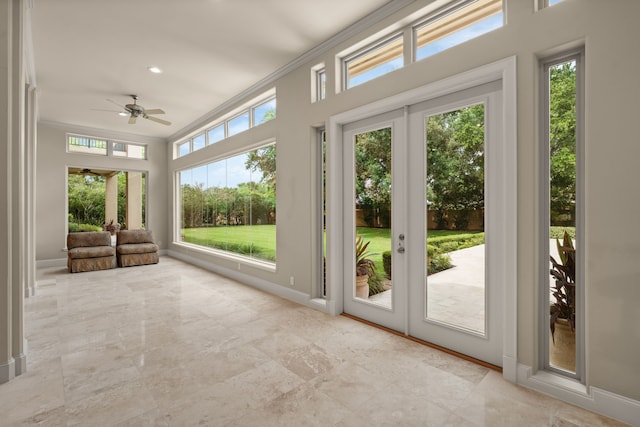 16 Grand Mnr, Sugar Land, TX 77479 - unfurnished sunroom featuring french doors, baseboards, crown molding, and marble finish flooring