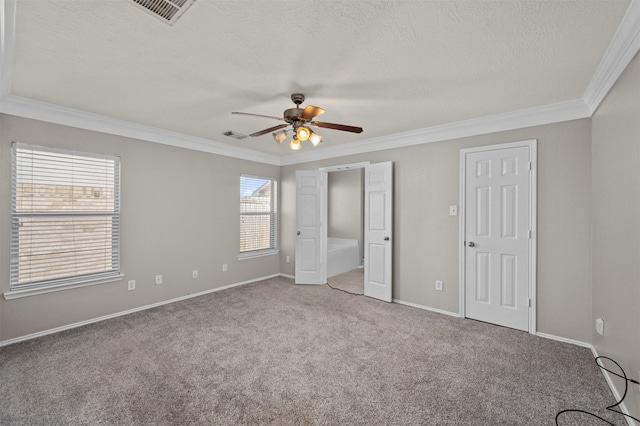 8014 Blackcherry Ln, Baytown, TX 77523 - unfurnished bedroom with crown molding, carpet, a textured ceiling, baseboards, and a ceiling fan