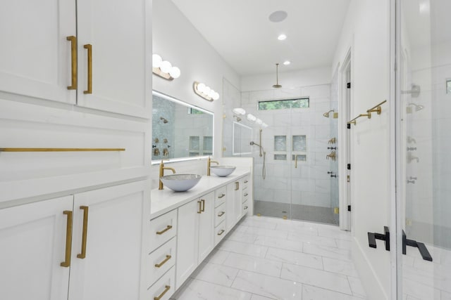 3505 Cobb St, Houston, TX 77004 - bathroom with a shower stall, double vanity, marble finish flooring, and recessed lighting