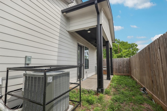 3505 Cobb St, Houston, TX 77004 - view of property exterior with central AC, a fenced backyard, and a patio area