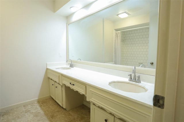 3911 Cypress Lake Dr, Spring, TX 77388 - full bathroom with double vanity, a shower with curtain, and baseboards