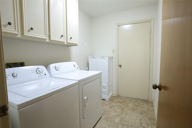 3911 Cypress Lake Dr, Spring, TX 77388 - laundry area featuring cabinet space and washing machine and clothes dryer