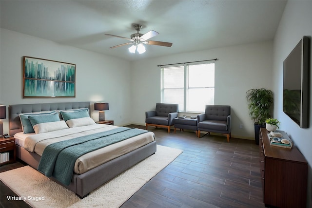 3911 Cypress Lake Dr, Spring, TX 77388 - bedroom with dark wood-type flooring, a ceiling fan, and baseboards