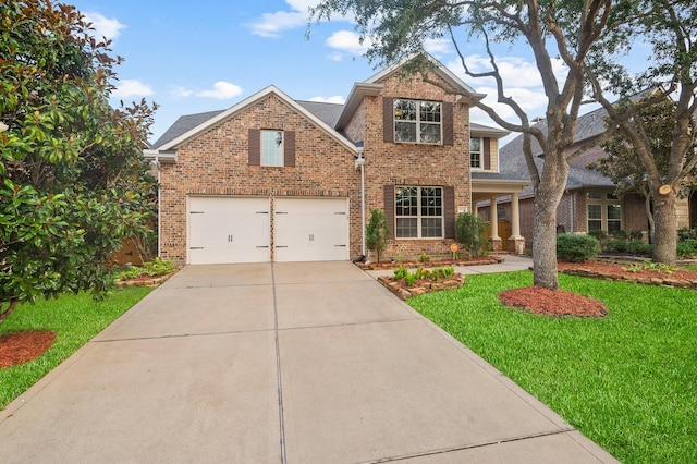 4726 Ashley Hope Dr, Katy, TX 77494 - traditional home with brick siding, driveway, a garage, a front lawn, and roof with shingles