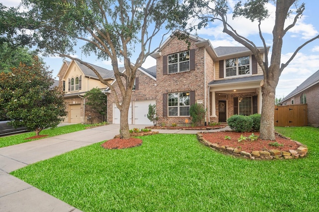 4726 Ashley Hope Dr, Katy, TX 77494 - traditional-style home with concrete driveway, brick siding, and a garage