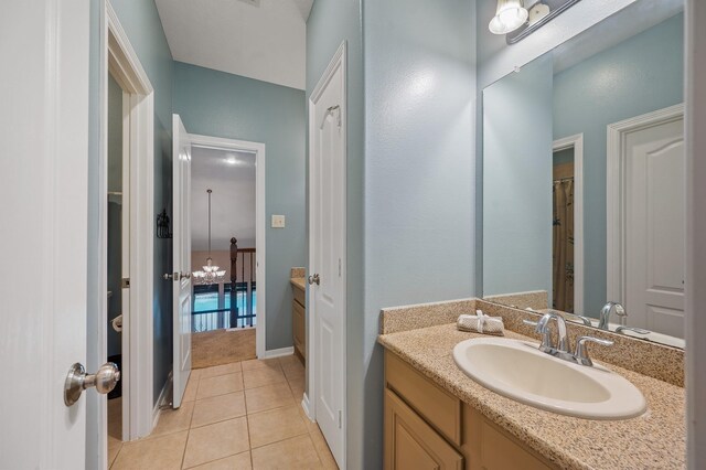 4726 Ashley Hope Dr, Katy, TX 77494 - full bath featuring vanity, tile patterned flooring, and a chandelier