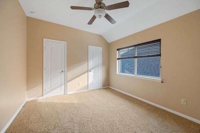 4726 Ashley Hope Dr, Katy, TX 77494 - unfurnished bedroom featuring baseboards, carpet floors, and vaulted ceiling