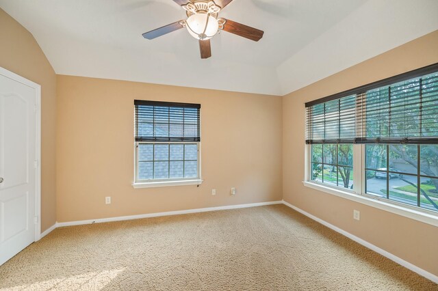 4726 Ashley Hope Dr, Katy, TX 77494 - empty room featuring vaulted ceiling, a ceiling fan, baseboards, and carpet flooring