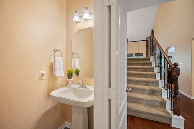 4726 Ashley Hope Dr, Katy, TX 77494 - stairway featuring wood finished floors and baseboards