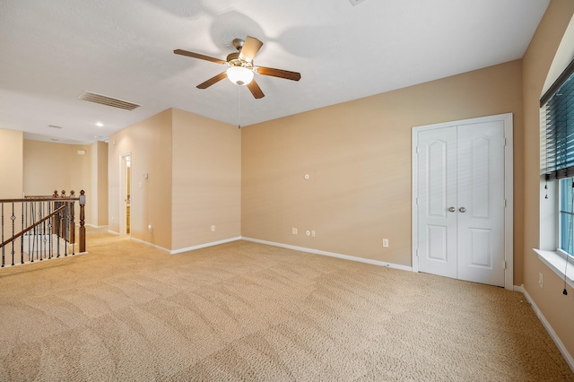 4726 Ashley Hope Dr, Katy, TX 77494 - spare room with ceiling fan, carpet, and baseboards