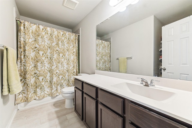 922 Steel Blue Dr, Houston, TX 77073 - bathroom featuring toilet, vanity, a shower with shower curtain, and baseboards