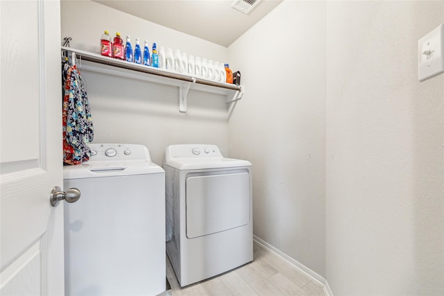 922 Steel Blue Dr, Houston, TX 77073 - laundry area with washer and dryer and baseboards