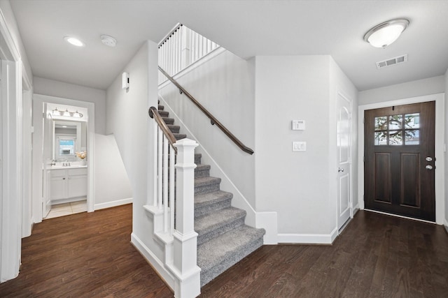 2020 Millbridge Spring Ln, Houston, TX 77051 - entryway with stairs, wood finished floors, and baseboards
