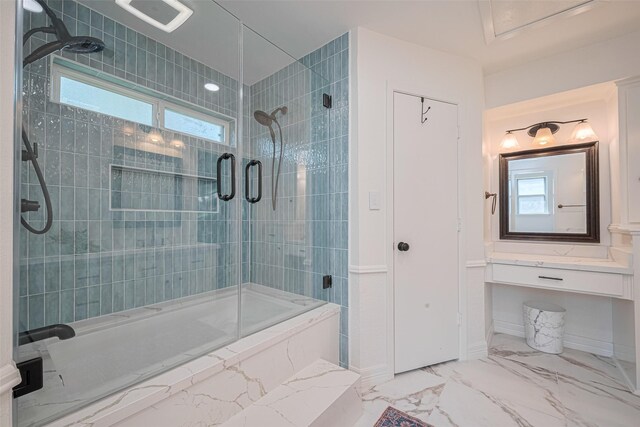 2831 Thorne Creek Ln, Houston, TX 77073 - bathroom featuring tiled shower, plenty of natural light, and marble finish floors