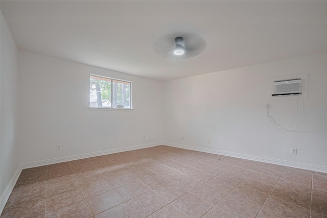 2831 Thorne Creek Ln, Houston, TX 77073 - empty room featuring a wall mounted AC, a ceiling fan, light tile patterned flooring, and baseboards