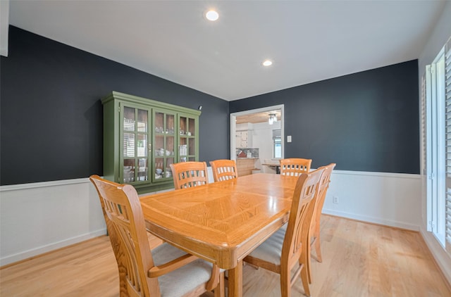 2831 Thorne Creek Ln, Houston, TX 77073 - dining area with light wood-type flooring and wainscoting
