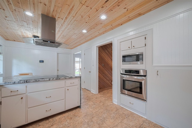 2831 Thorne Creek Ln, Houston, TX 77073 - kitchen with appliances with stainless steel finishes, wooden ceiling, island range hood, white cabinetry, and recessed lighting