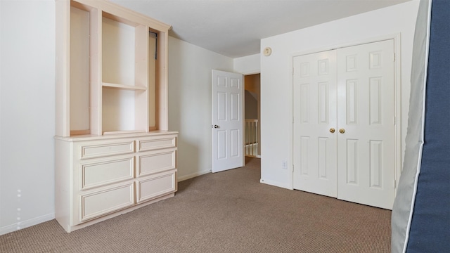 12422 Glenleigh Dr, Houston, TX 77014 - unfurnished bedroom featuring light carpet, a closet, and baseboards