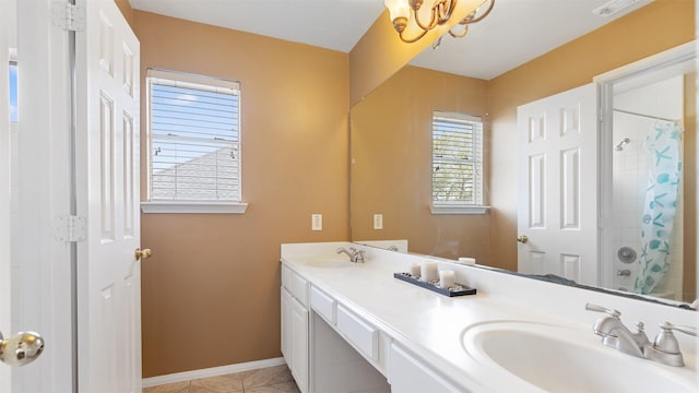 12422 Glenleigh Dr, Houston, TX 77014 - full bath featuring double vanity, a shower with curtain, a chandelier, and tile patterned floors