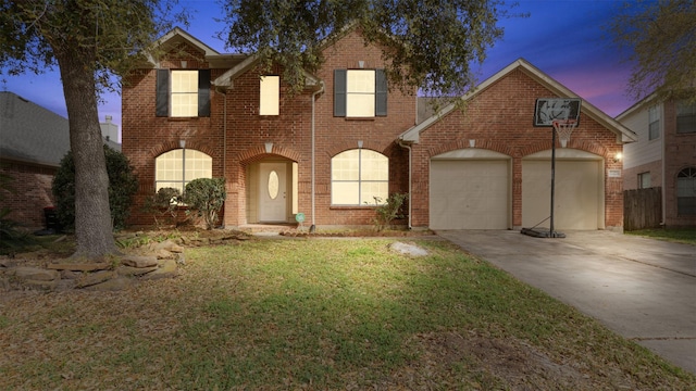 12422 Glenleigh Dr, Houston, TX 77014 - traditional-style house with driveway, an attached garage, brick siding, and a yard