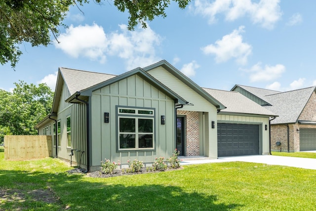 5206 4th St, Danbury, TX 77534 - view of front of property featuring board and batten siding, a garage, driveway, and a shingled roof