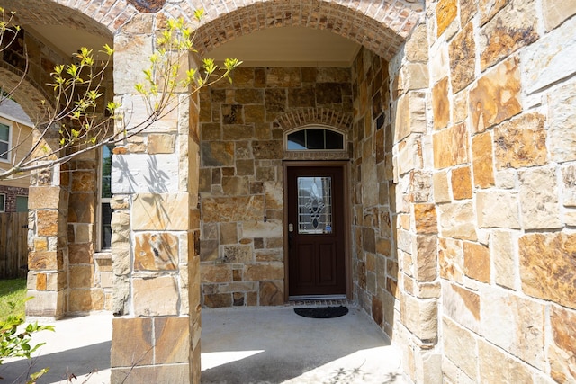 6707 Hunters Creek Ln, Baytown, TX 77521 - doorway to property featuring stone siding