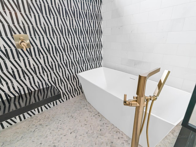 2037 Norfolk St, Houston, TX 77098 - bathroom featuring a freestanding bath