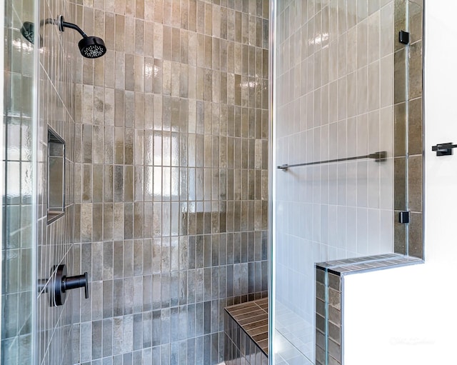2037 Norfolk St, Houston, TX 77098 - bathroom featuring a tile shower
