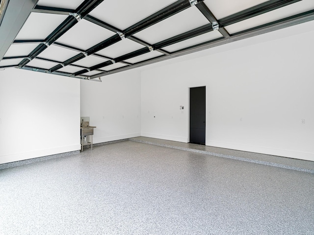 2037 Norfolk St, Houston, TX 77098 - garage with baseboards