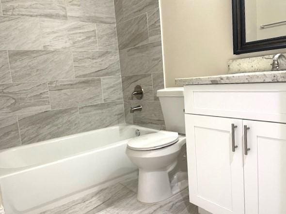 9310 Coffee St, Houston, TX 77033 - full bath with toilet, vanity, and shower / tub combination