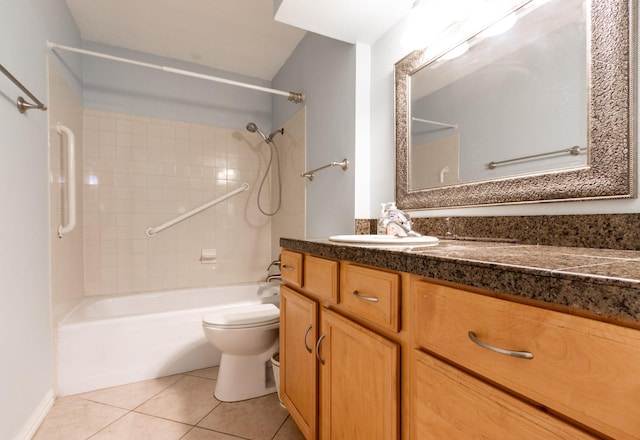 1726 Broadway Unit 19, Galveston, TX 77550 - full bathroom featuring toilet, bathing tub / shower combination, vanity, and tile patterned floors