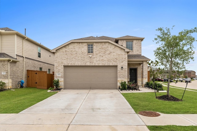 21123 Coral Blossom Ln, Cypress, TX 77433 - view of front of house with brick siding, concrete driveway, a front yard, and roof with shingles