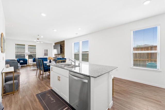 21123 Coral Blossom Ln, Cypress, TX 77433 - kitchen with dishwasher, a sink, healthy amount of natural light, open floor plan, and recessed lighting